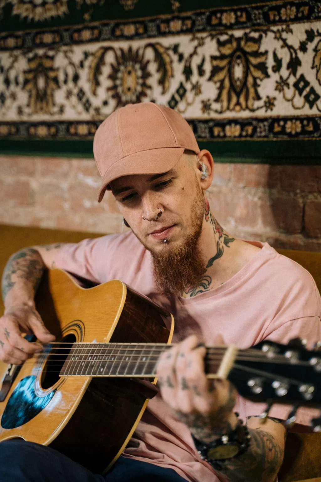 Professional musician performing on stage with Hypear custom in-ear monitors (CIEM) - providing stage monitoring, hearing protection from loud volumes, and clear sound reproduction for live performance